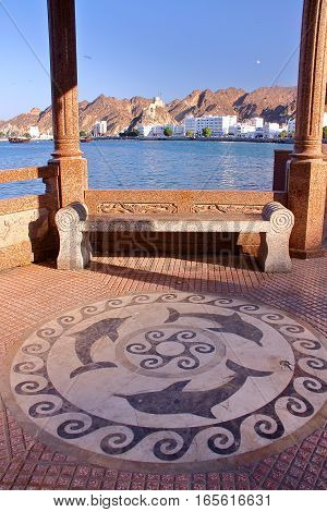 MUSCAT, OMAN: The sidewalk decorated with dolphins in Muttrah