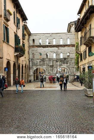 VERONA, ITALY - MAY 1, 2016: Porta Borsari - ancient Roman gate in Verona Italy.