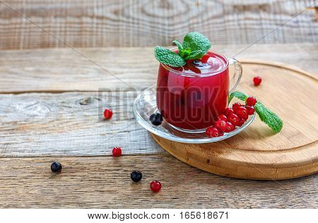 Berry Jelly(kissel) In Glass Cup And Sprig Of Mint.
