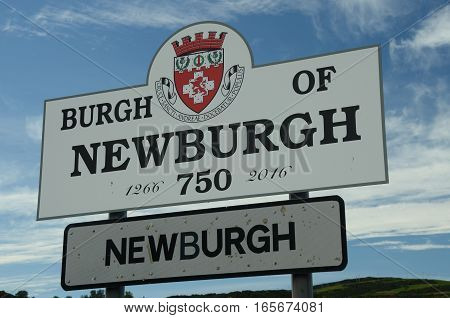 A view of the entrance to Newburgh sign