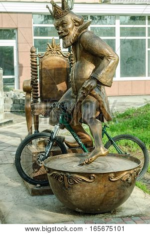 Tobolsk, Russia - May 2, 2010: Monument to the Tsar from the fairy tale Konek-Gorbunok of Yershov with joke from biker