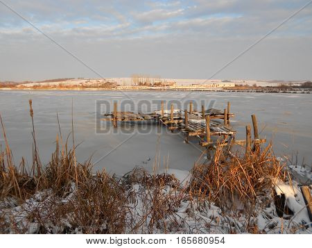 landskape winter sunrise on the frozen lake