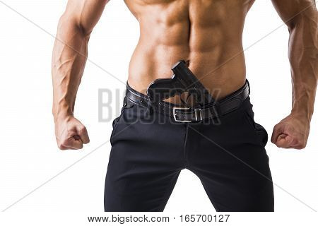 Half body Shot of a Handsome Athletic Man with no Shirt with Handgun Shoved in His Pants. Isolated on White Background.