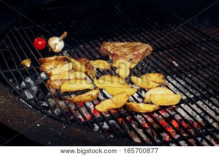 Potatos Meat Garlic And Tomato Pepper Grilling. Catering In Food Court At Mall Concept. Space For Te