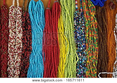 colourful microbead jewelery closeup in Ecuador Otavalo