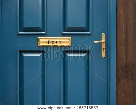 Blue modern classic door with knob or handle and post