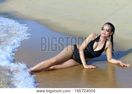 Lady show sexy swimsuit in Ban Krut Beach at Prachuap Khirikhun Province Thailand