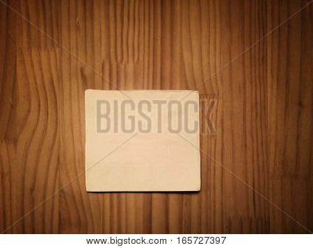 beige modern cocktail napkin on wooden table