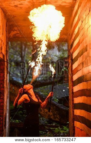 fire show Fire Breather Large Plume Of Flame the girl