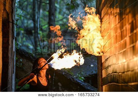 fire show Fire Breather Large Plume Of Flame the girl