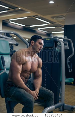 The young guy at the gym. Hard work. Healthy lifestyle.