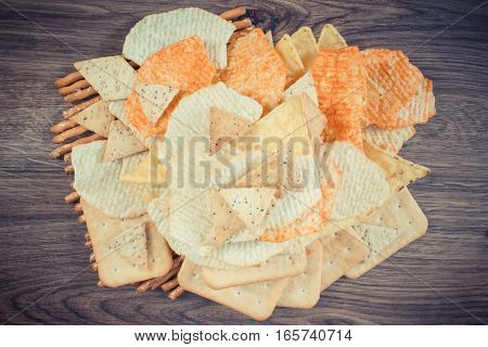 Vintage Photo, Heap Of Salted Crisps, Breadsticks And Cookies, Concept Of Unhealthy Food