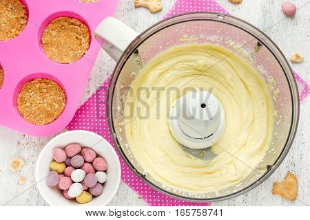 Easter nest cake cooking Easter recipe step by step preparation of Easter dessert mini cheesecakes with candy eggs
