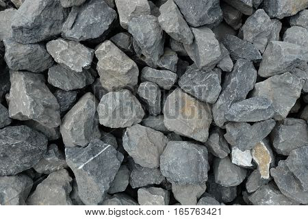aggregate / gravel of very large gray stones at a stonepit