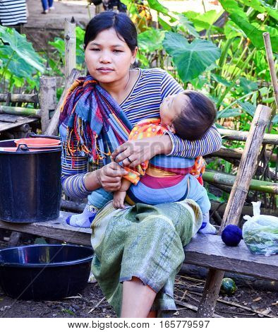 Kayan Mother And Daughter In Thailand Hill Village