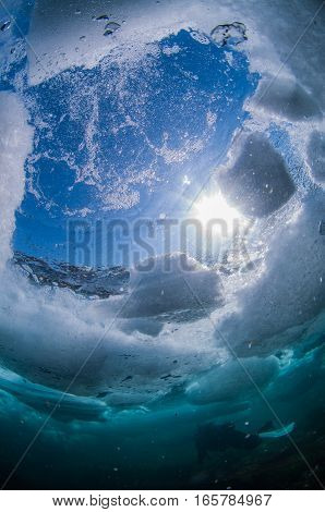 Drift Ice Diving in Shiretoko Utoro , Hokkaido , Japan.