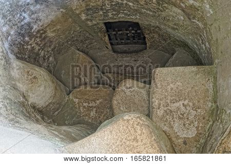 spiral stairs leading to an underground tomb in Tierradentro Colombia