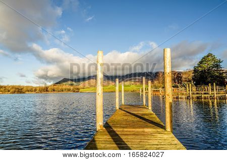 A wooden jetty on Derwentwater in the English Lake District.