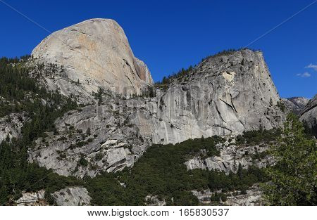 Half Dome (south face) and Mount Broderick. Photographed from the John Muir Trail, Yosemite National Park, California.