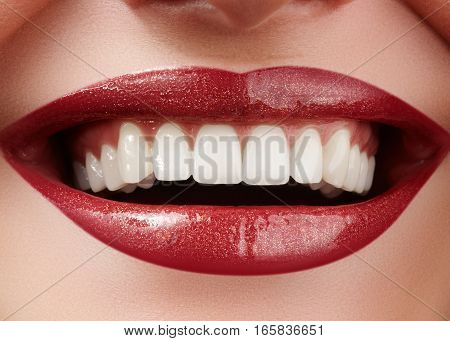 Beautiful smile with whitening teeth. Dental photo. Macro closeup of perfect female mouth lipscare rutine.