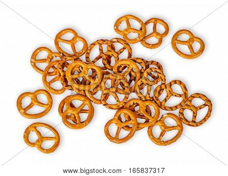 Heap crunchy pretzels with salt isolated on white background