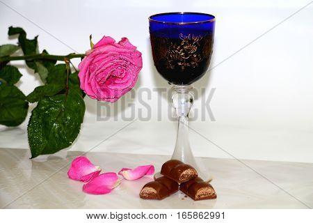 The wine with dessert. Red wine candy gives a romantic mood. Rose heightens romance and uplifting.