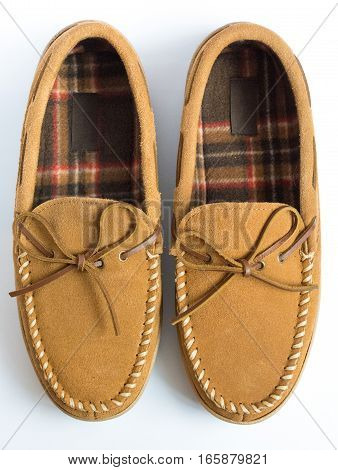 Pair Of Moccasin Slippers Top View Closeup