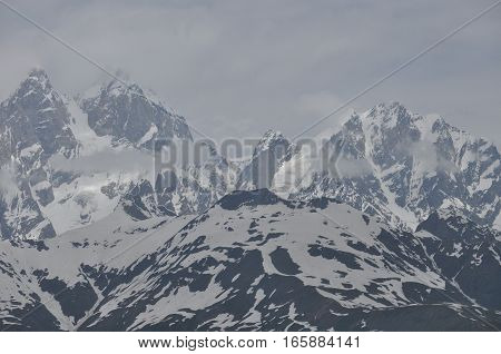 Ushba peak in the Caucasus Mountains. Snowy playing.