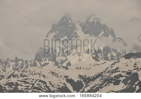 Ushba peak in the Caucasus Mountains. Snowy playing.