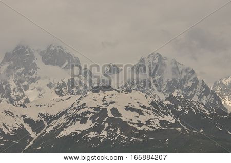Ushba peak in the Caucasus Mountains. Snowy playing.
