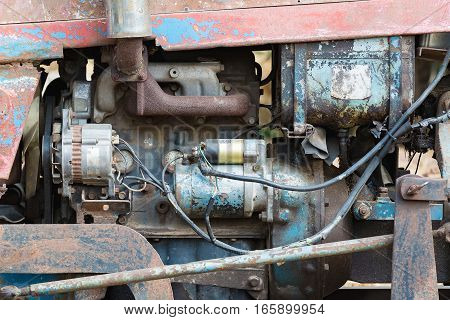 Vintage engine car system. Part of old diesel engine of heavy truck closeup grunge rusty and oil dirty.