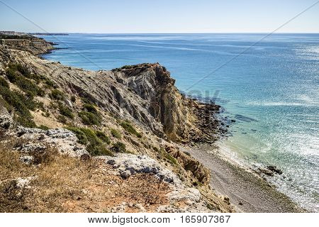 Walking along the coastline in Algarve, Portugal