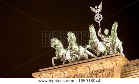 The Brandenburg Gate in Berlin Germany with the famous quadriga visible on top.