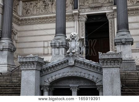 Lion with wings symbol of the French city of Lyon. Detail architecture Basilica of Notre-Dame de Fourviere is located on the hill of Fourviere. Lyon. France.