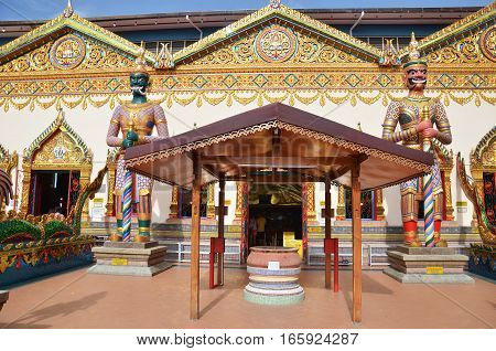 Statue Standing Outside Wat Chayamangkalaram Located In Penang