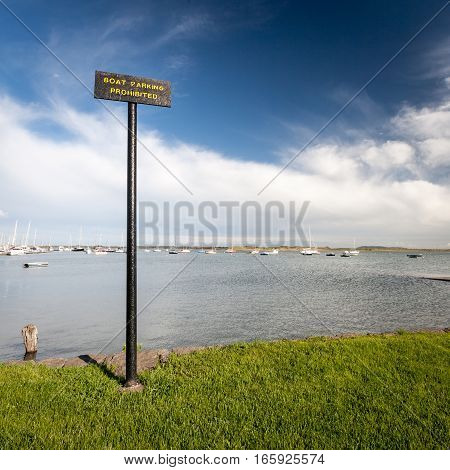 A sign at a marina near Malahid Ireland warning boat owners that parking is prohibited in the area.