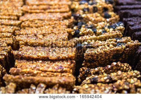 Raw healthy dessert handmade from dates and nuts - gozinaki