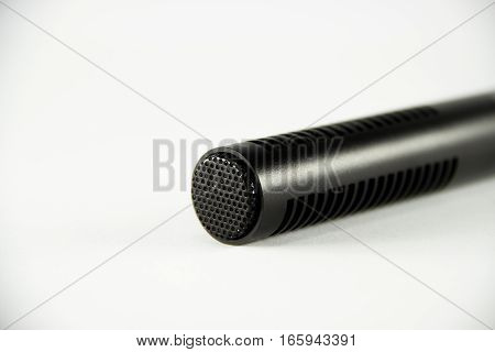 production, mike, television, tv, audio, microphone, professional, directional, mic, boom, media, object, news, isolated, industry, movie, pole, up, technology, fish, sound, recording, shotgun, white, equipment, background, film, rifle, cable, gun, close,