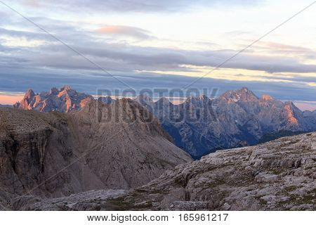 Sexten Dolomites Mountains Panorama With Alpenglow At Sunrise In South Tyrol, Italy