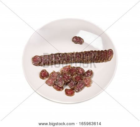 Plate with sausage sliced Fouette isolate on a white background