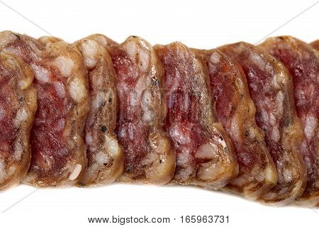 Fouette sausage sliced close up isolate on a white background
