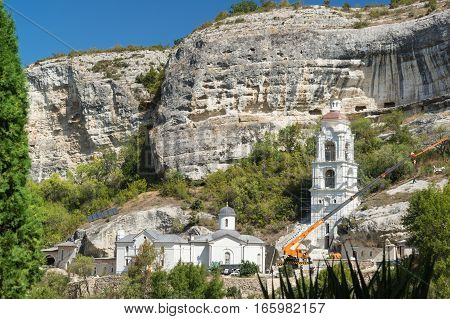 BAKHCHYSARAY CRIMEA RUSSIA - SEPTEMBER 13.2016: The construction of the temple on the territory of the Holy Dormition cave monastery