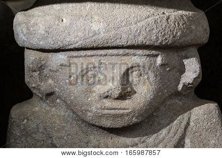 ancient pre-columbian statue closeup in San Agustin Colombia in Altos de los Idolos San Agustin Colombia