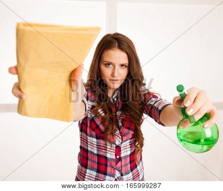 Happy Young Woman Cleaning Windows Isolated Over White Vackground