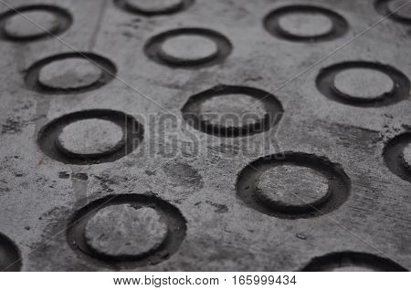 Floor Texture. Ringlet marks on grey concrete floor 