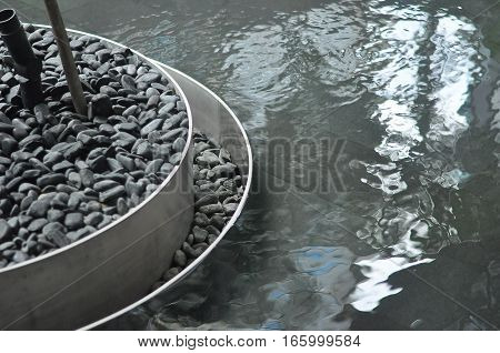 Circular Planter Edge Detail on Relfective Pool
