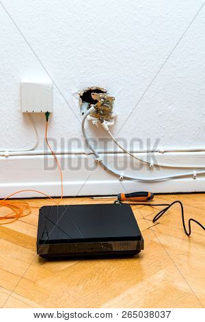 Fiber Optic Installation On Home Wall With Obsolete Catv And New Ftth Fiber Outlets Plug And Interne
