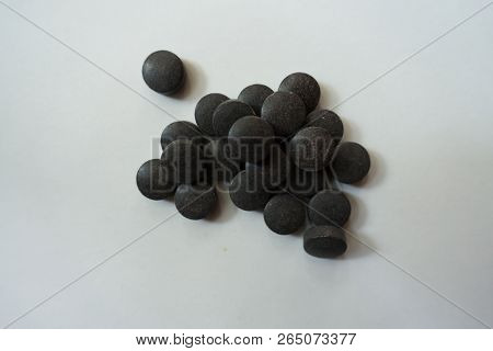 Tablets Of Chelated Iron In A Heap From Above