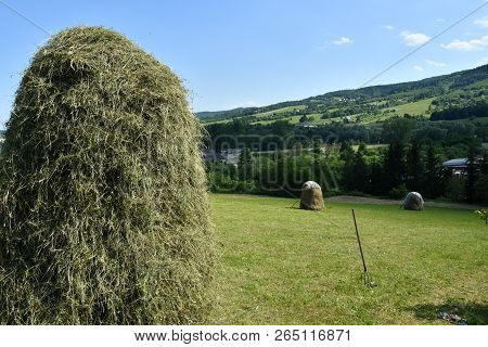 Tradition Scythe For Mowing The Green Grass On Meadow