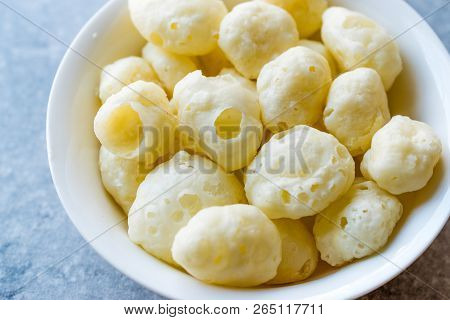 Organic Baked Cheese Ball Chips In Bowl.